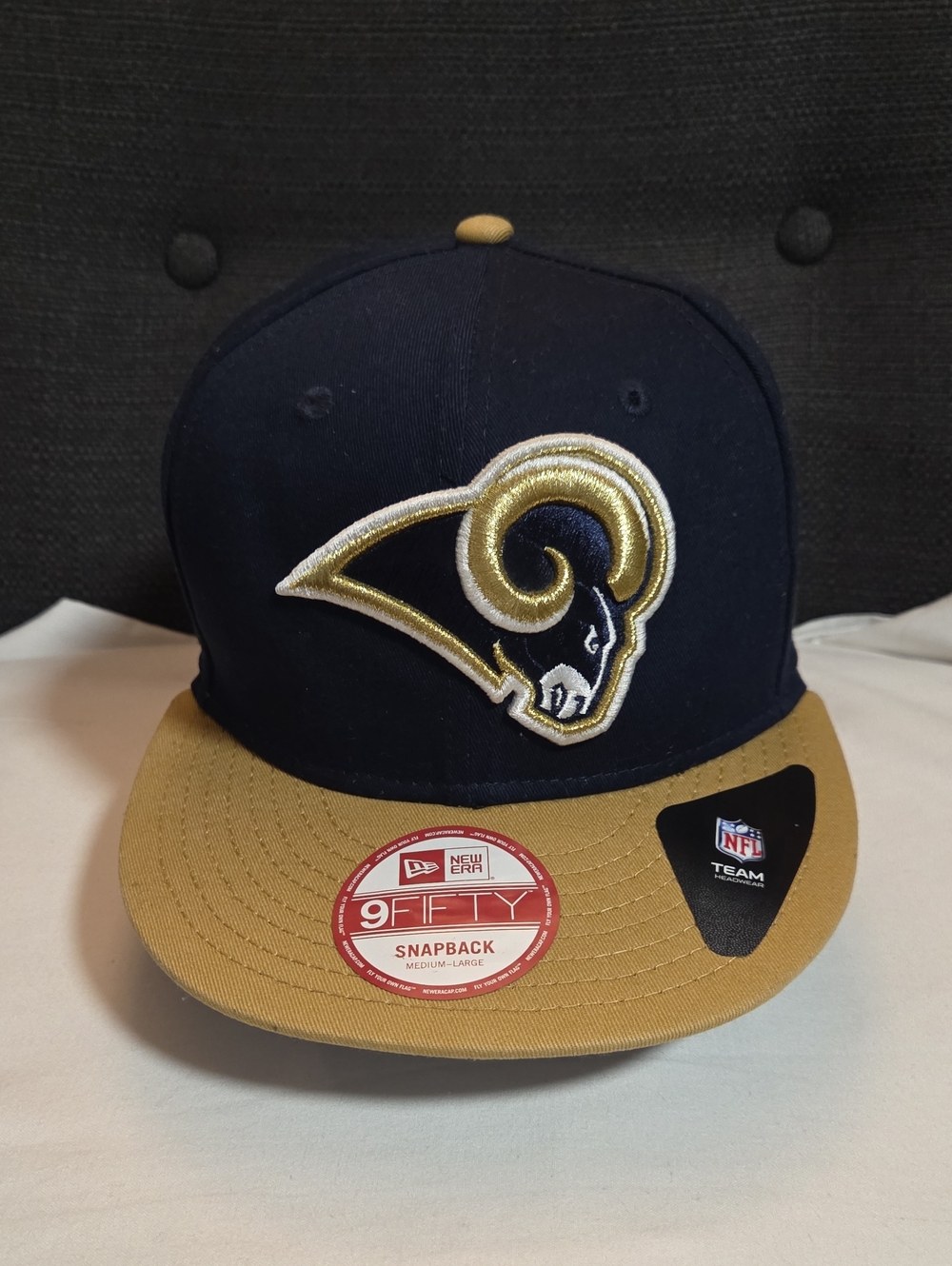 New Era Los Angeles Rams Navy and Gold Snapback Hat